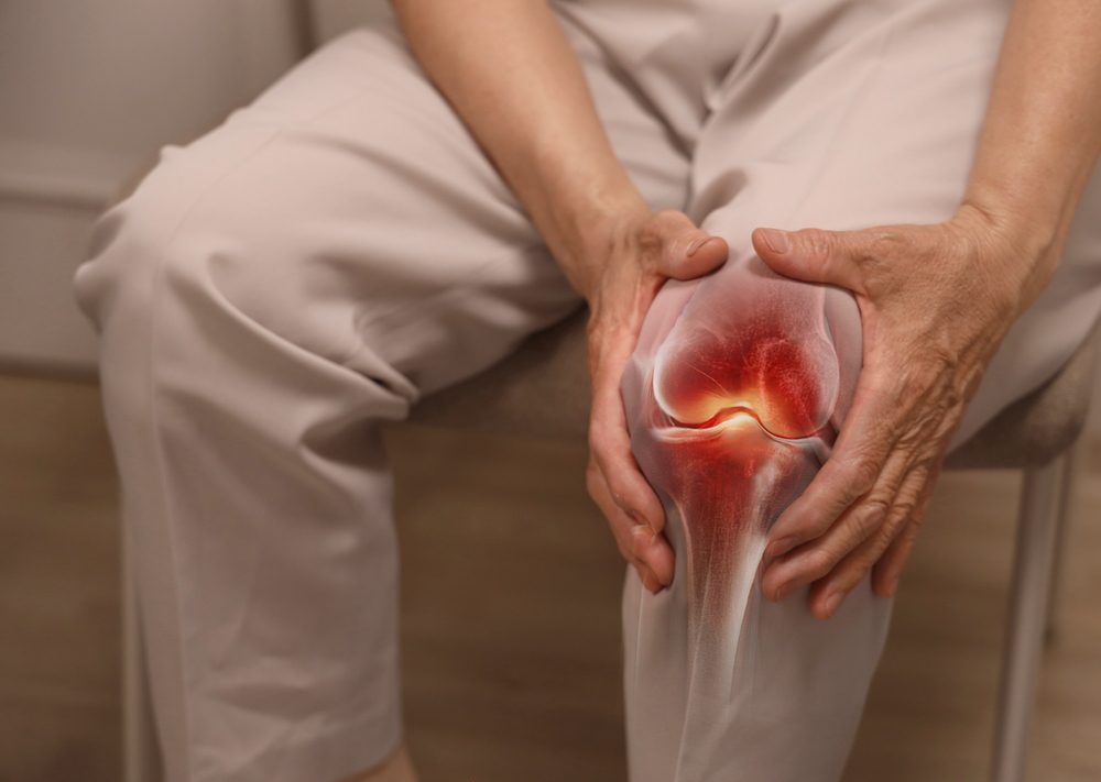 Person with osteoarthritis in the knee in pain due to it's progression 