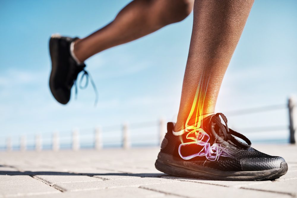 ankle pain runner image depicting the bone structure of an ankle of a runner as they are running