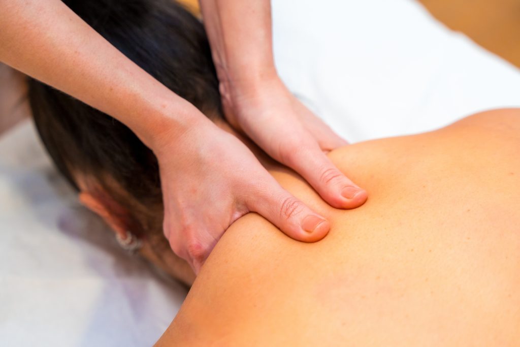 treatment for occiptal neuralgia Person getting a massage to help them with Occiptal Neuralgia