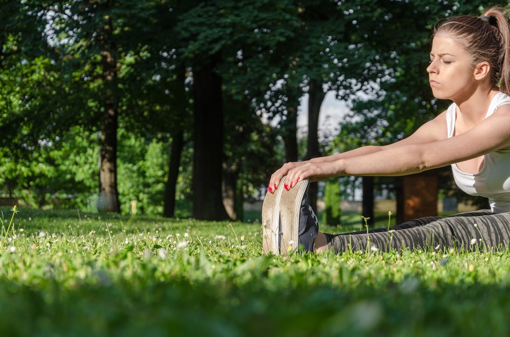 Woman with herniated disc working out