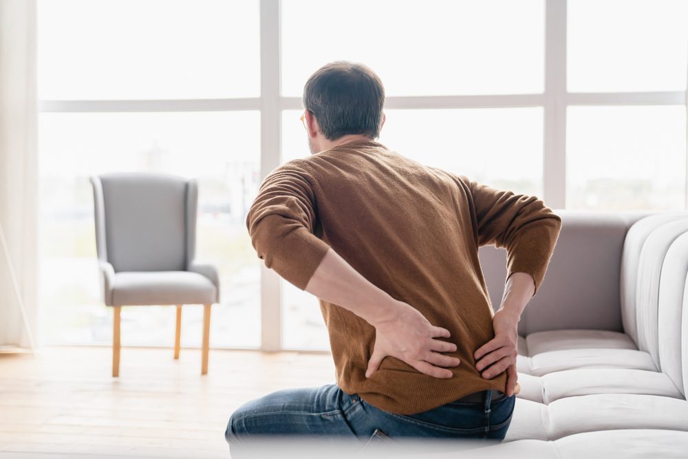 Man suffering with back pain Man suffering with back pain
