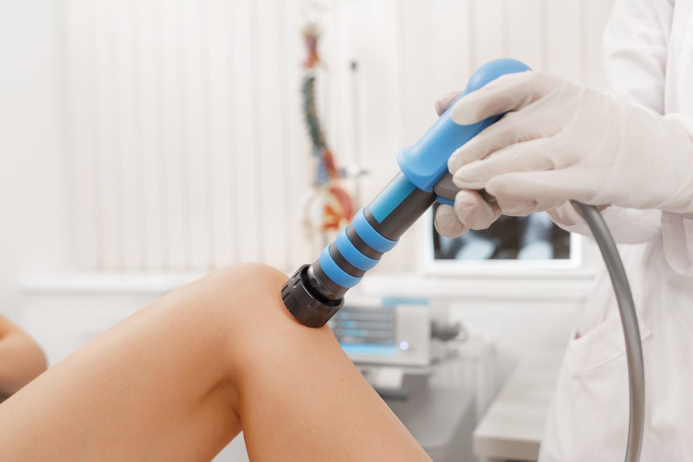 Shockwave therapy for pain. Shockwave therapy being used to help treat knee pain.