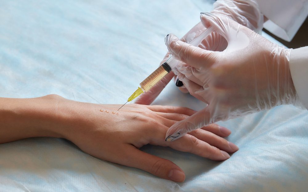 Stem cells helping with pain Stem cells being injected into hand to help with pain