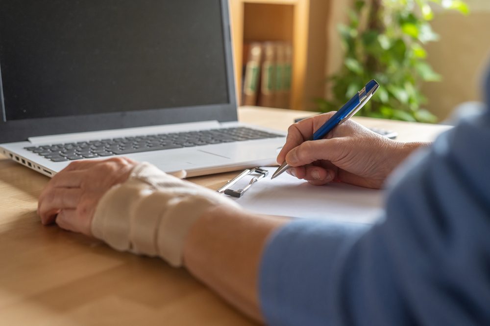 Tendon injury healing Wrist tendon injury in a worker being helped by a splint.