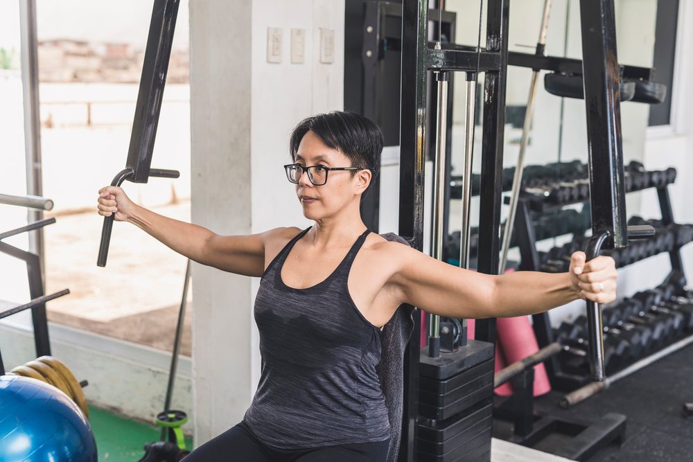 Pectoral Muscle exercise Elderly woman exercising her Pectoral Muscle