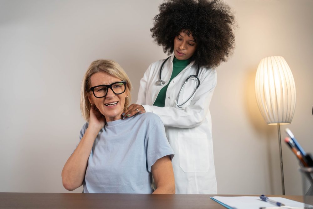 Neck Arthritis treatment. Neck Arthritis being Diagnosed by a doctor.